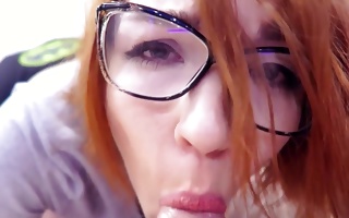 Raunchy red-haired in glasses sucks and takes a messy facial in beginner xxx