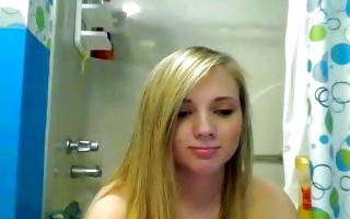Naughty beautiful blonde girlfriend shaves her twat in a bath